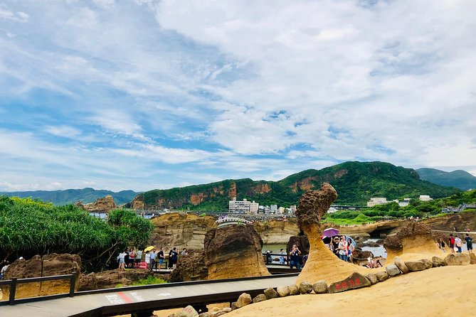 One-day private chartered car tour in Taipei: Yehliu, Jiufen, Pingxi, North Coast popular attractions with chartered car, professional Chinese/English driver - Shifen Old Street and sky lanterns by the rail line