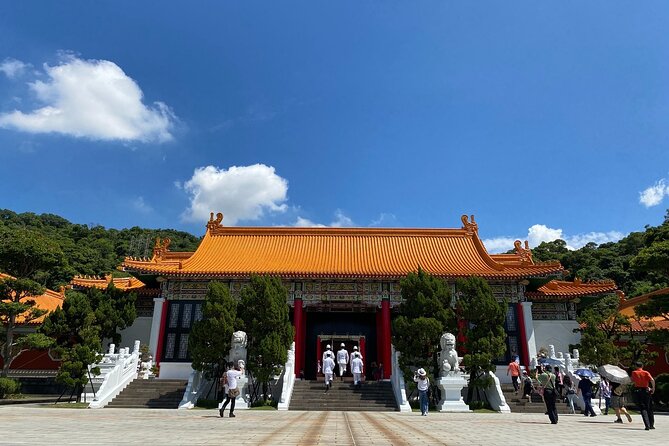 Taipei City Morning Tour with National Palace Museum entry - Longshan Temple: where Taipei religion feels everyday, not staged